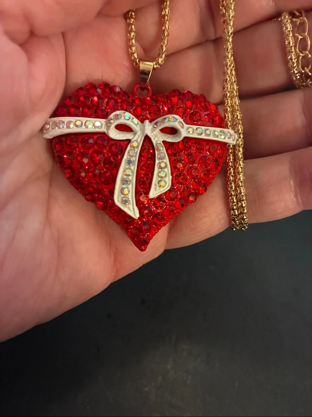 Red Crystal Heart Pendant Necklace with Bow Accent crystals on the bow.